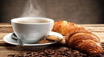 Yerel yemeklerinden ve çeşit çeşit kahvelerinden tadın