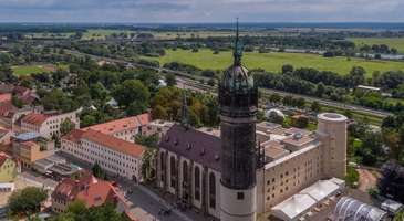 Schlosskirche Kilise’ni ziyaret edin