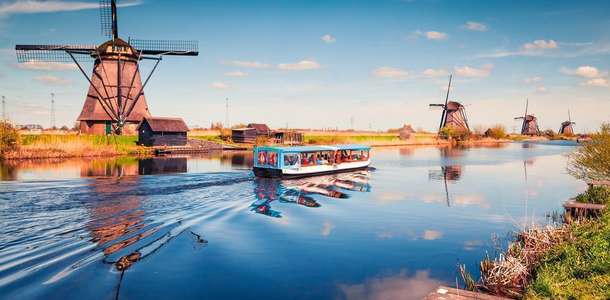 Kinderdijk Yel Değirmenleri'nde güneşin batışını seyredin